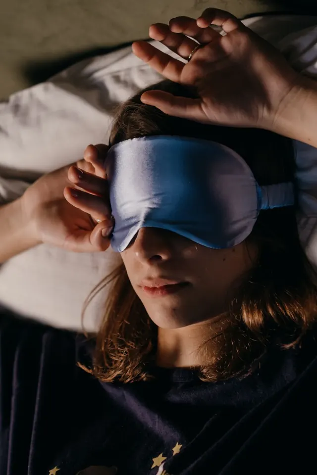Contoured sleep mask