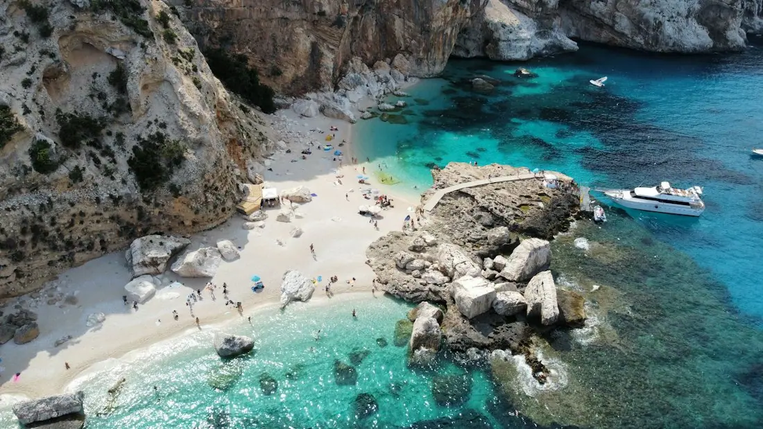 A white rocky cove with turquoise water in Sardinia